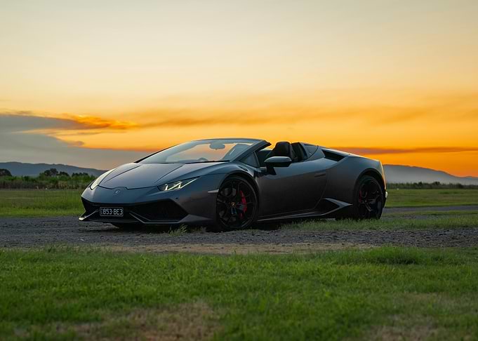 Gray Lamborghini Huracan at Sunset