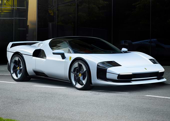 White Ferrari SC40 on the street