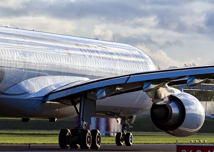 Silver Airplane Close-Up on Runway