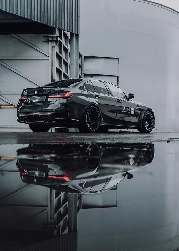 Sleek Black Car Reflection