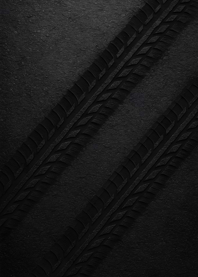 Black Tire Tracks on Asphalt