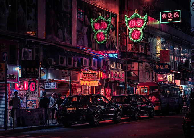 Neon-lit Hong Kong street at night