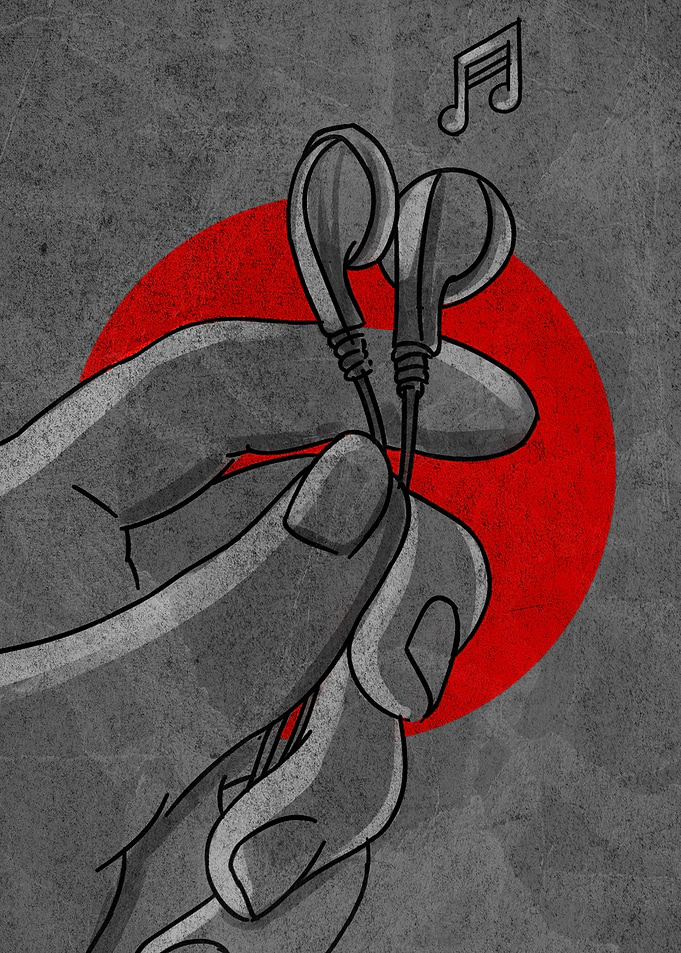 Hand holding earphones with music note