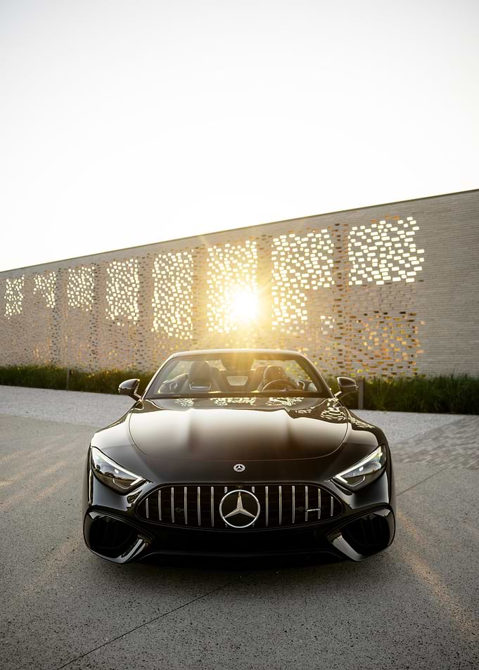 Black Mercedes-AMG SL Roadster at Sunset