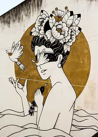 Woman with Birds and Floral Crown