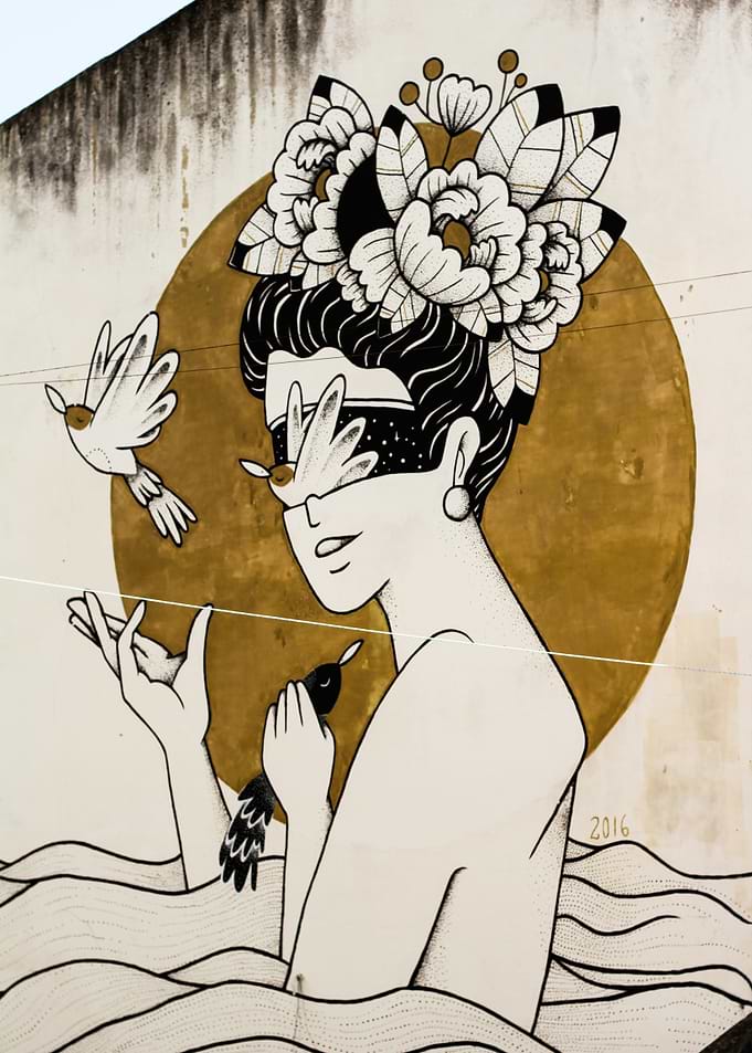 Woman with Birds and Floral Crown