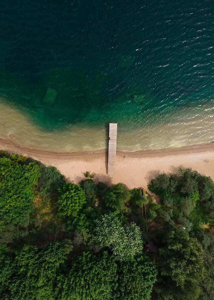 Aerial view of lake and pier
