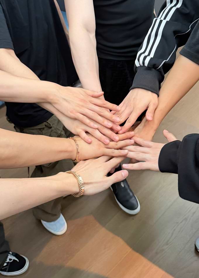 Teamwork: Hands Together in Unity