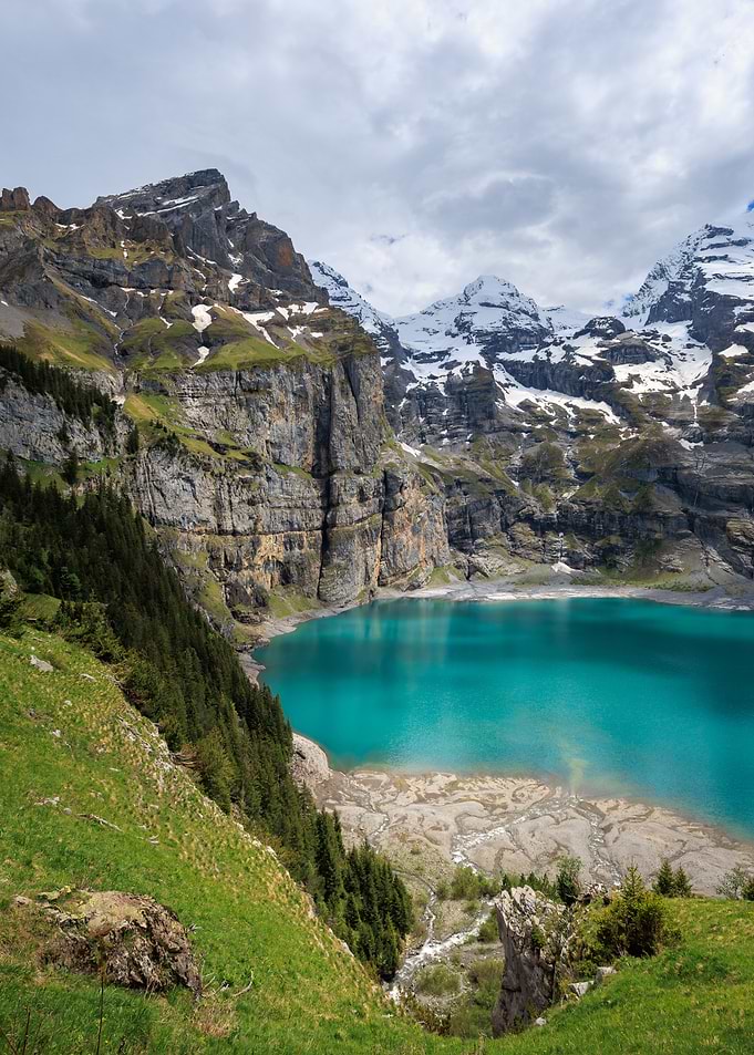 Turquoise Lake Surrounded by Mountains