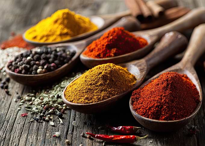 Assorted Spices in Wooden Spoons