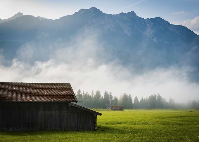 Foggy Mountain Landscape with Barn