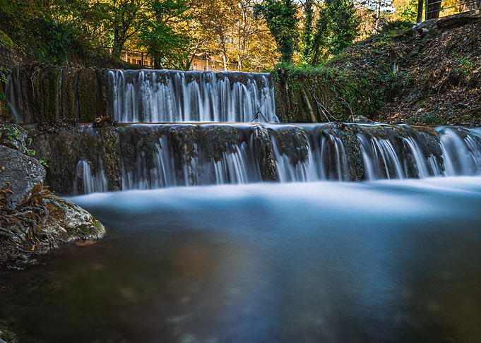 Cascading Waterfall in Autumnal Setting