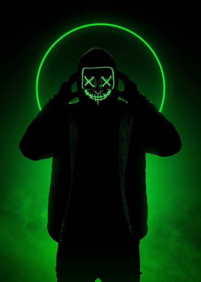 Neon Masked Figure in Green Light