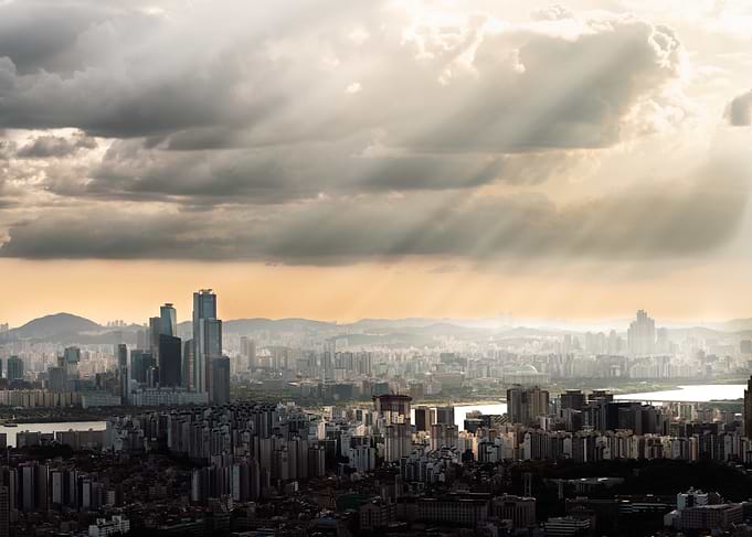Seoul Cityscape Under Dramatic Sky