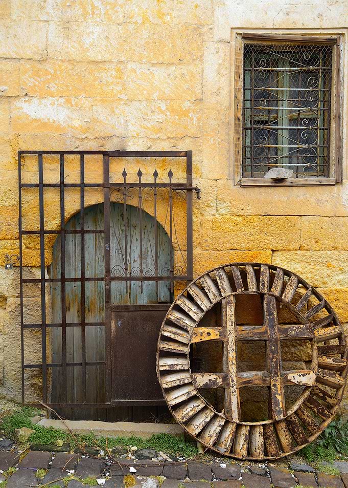 Rustic Iron Gate and Weathered Stone Wall – Vintage Architecture Art
