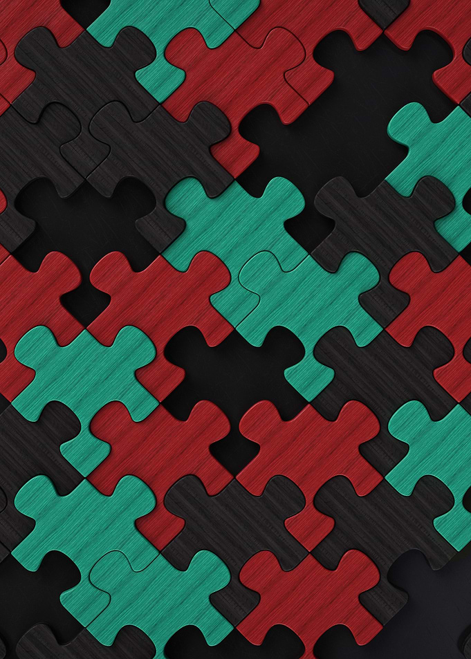 Colorful Puzzle Pieces on Dark Background
