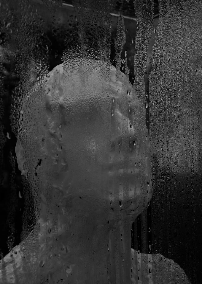 Monochrome Figure Behind Wet Glass