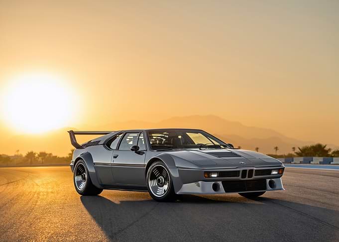 Gray BMW M1 at Sunset
