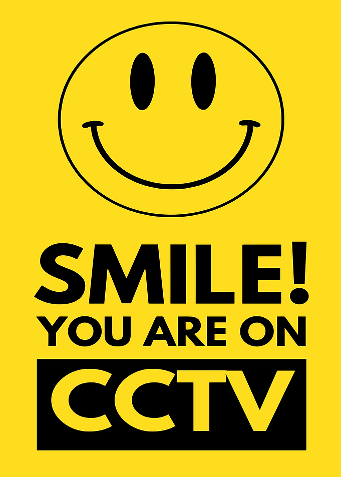 Smile! You are on CCTV sign