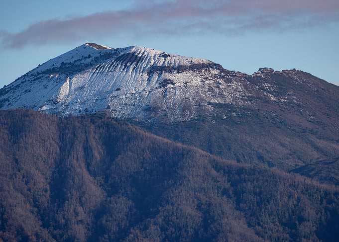 Snowy peak of Mount Vesuvius at dawn