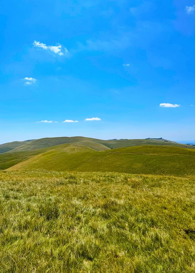Green Hills Under a Blue Sky