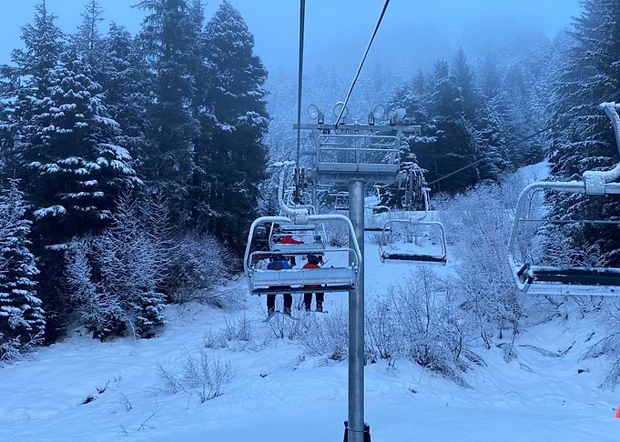 Ski lift in Alaska snowy mountain landscape