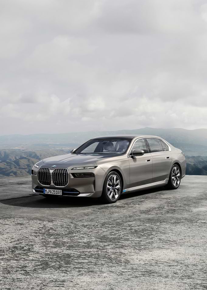 Silver BMW Sedan on Concrete Platform