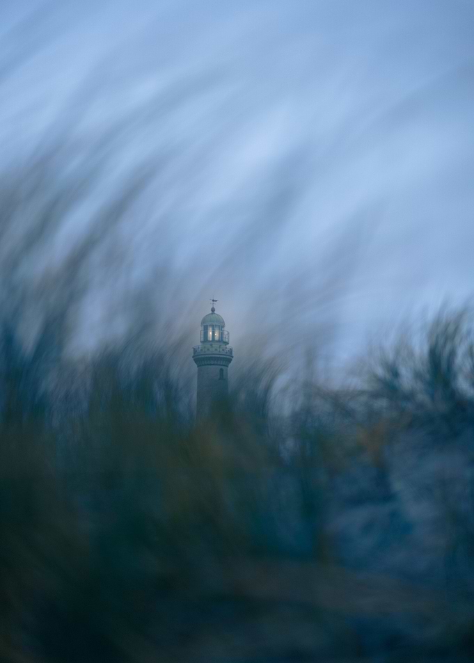 Lighthouse through the grass