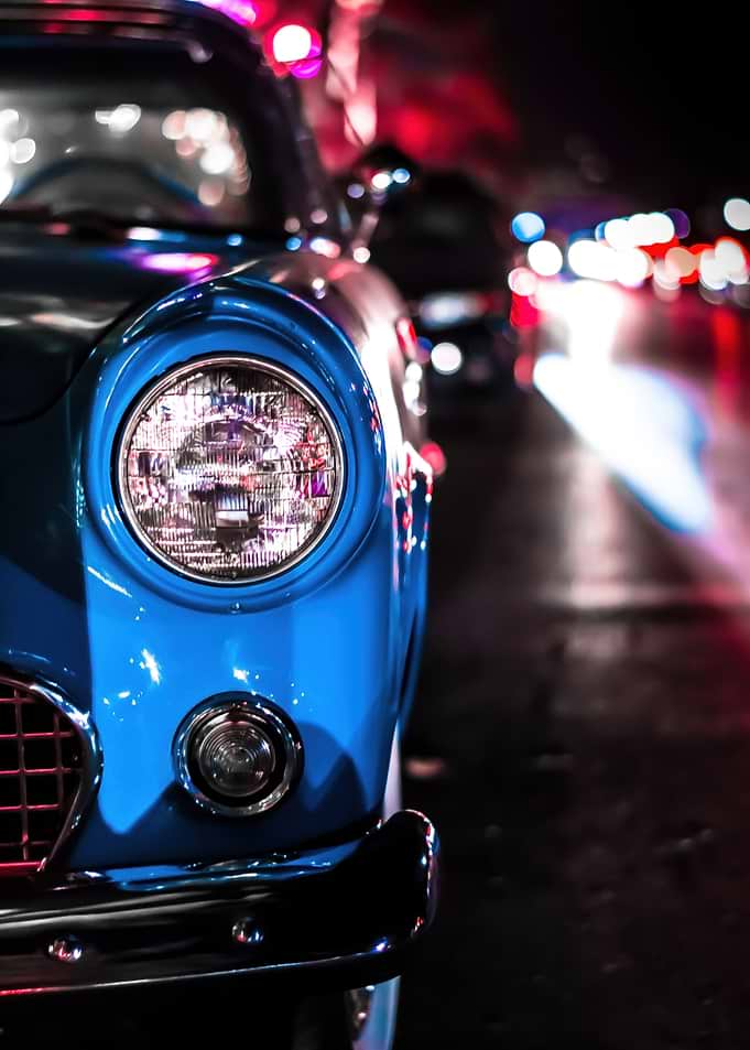 Blue Vintage Car Headlight Close-Up