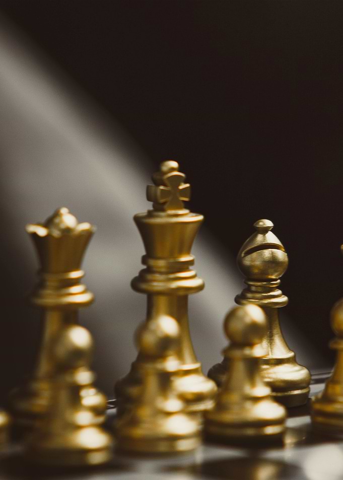 Golden Chess Pieces Close-Up