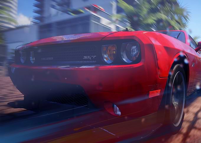 Red Dodge Challenger SRT in motion