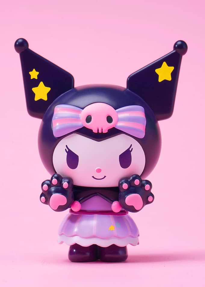 Kuromi Figurine on Pink Background