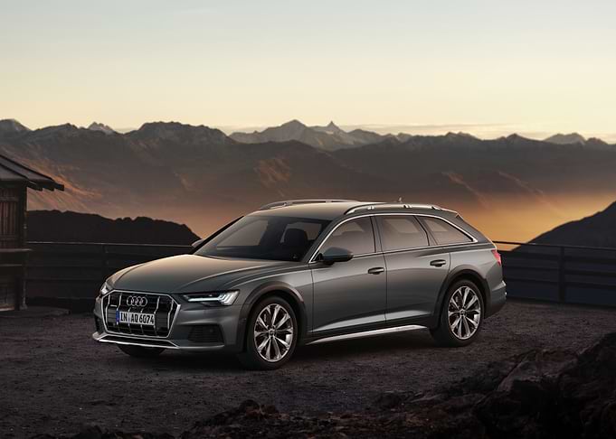 Gray Audi A6 Allroad in Mountains