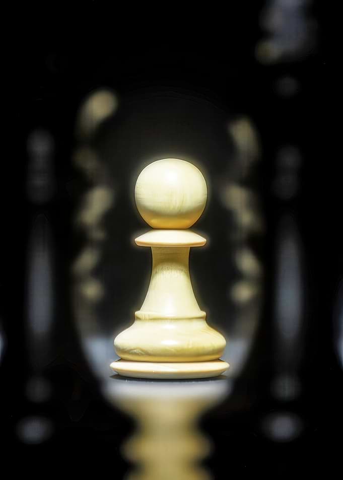 Chess Pawn on Reflective Surface