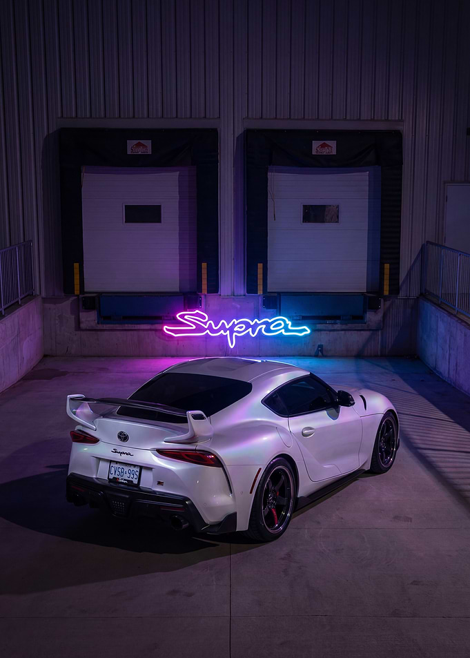 White Supra with Neon Sign