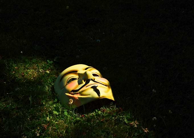 Guy Fawkes mask on grass