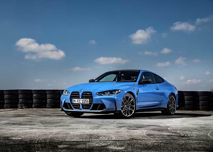 Blue BMW M4 Coupe on Track