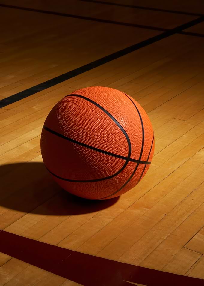 Basketball on a Wooden Court