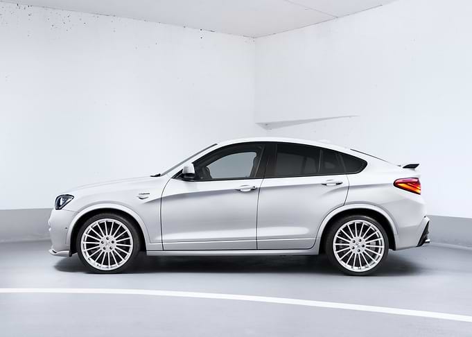 Silver SUV in a White Room