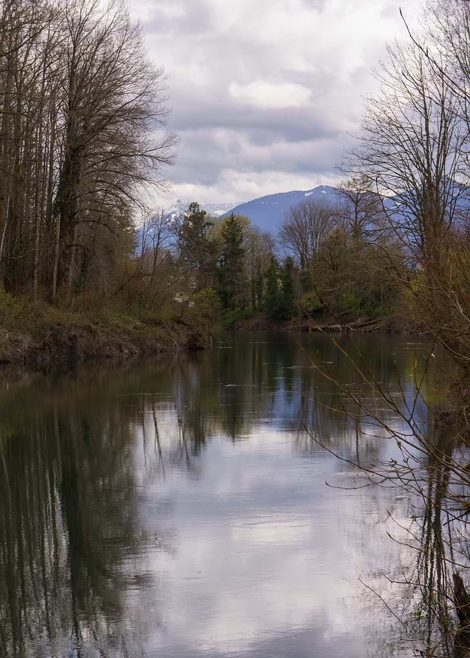River landscape with mountain backdrop