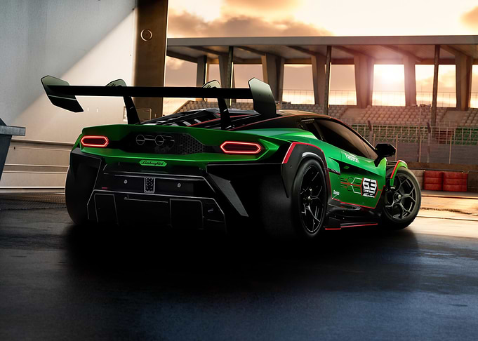 Green Lamborghini on Racetrack at Sunset