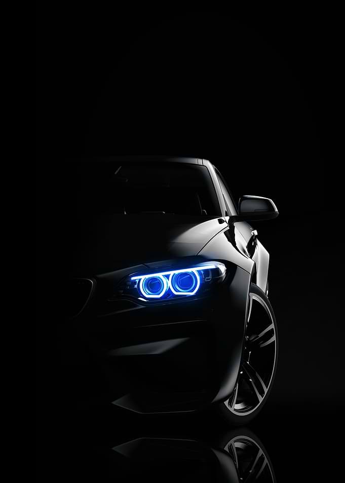 Sleek Car with Blue Headlights