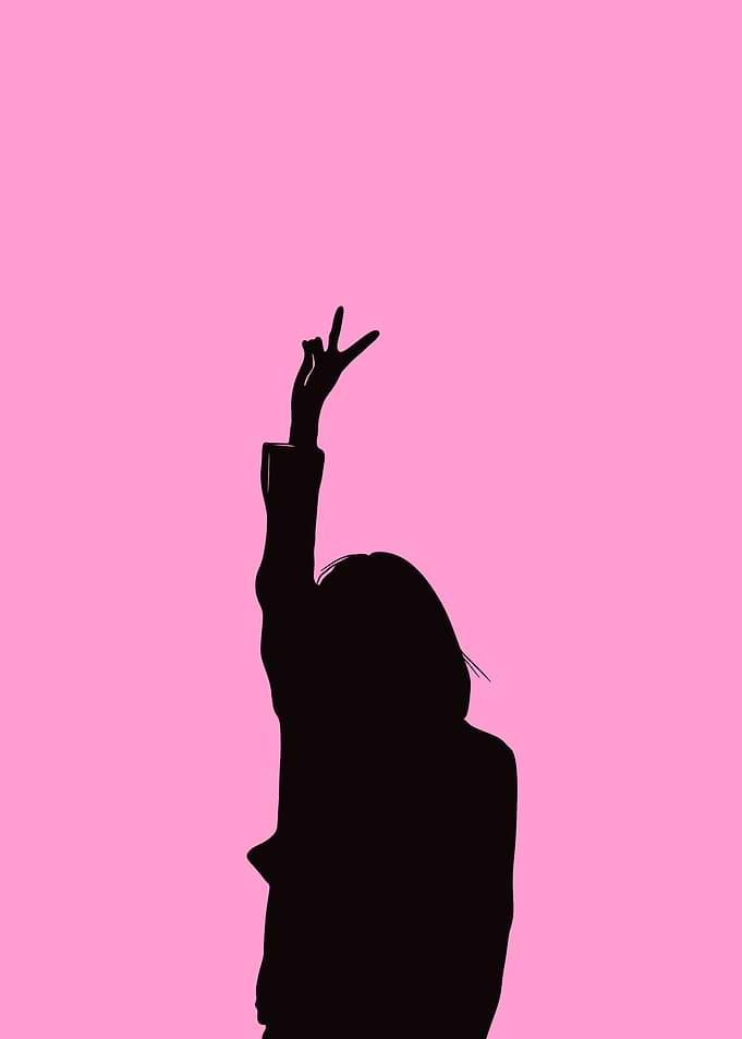 Silhouette with Peace Sign on Pink
