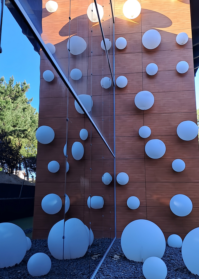 Modern building facade with sphere decorations