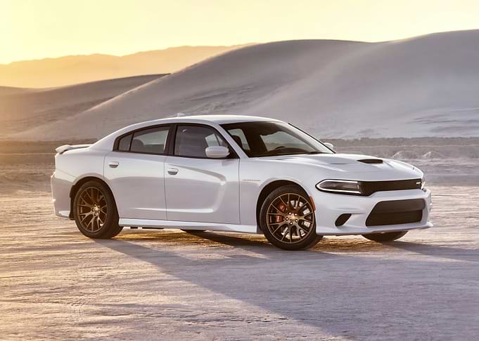 White Dodge Charger in Desert Landscape