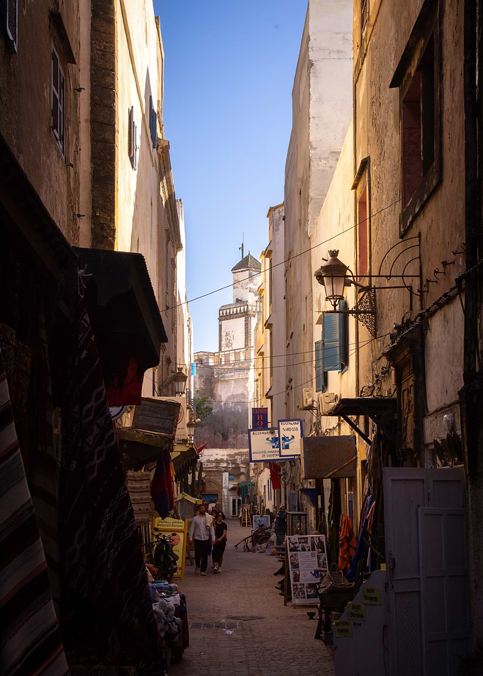 Moroccan street with tower in background