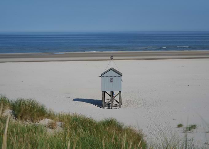 Beach hut on a sandy beach