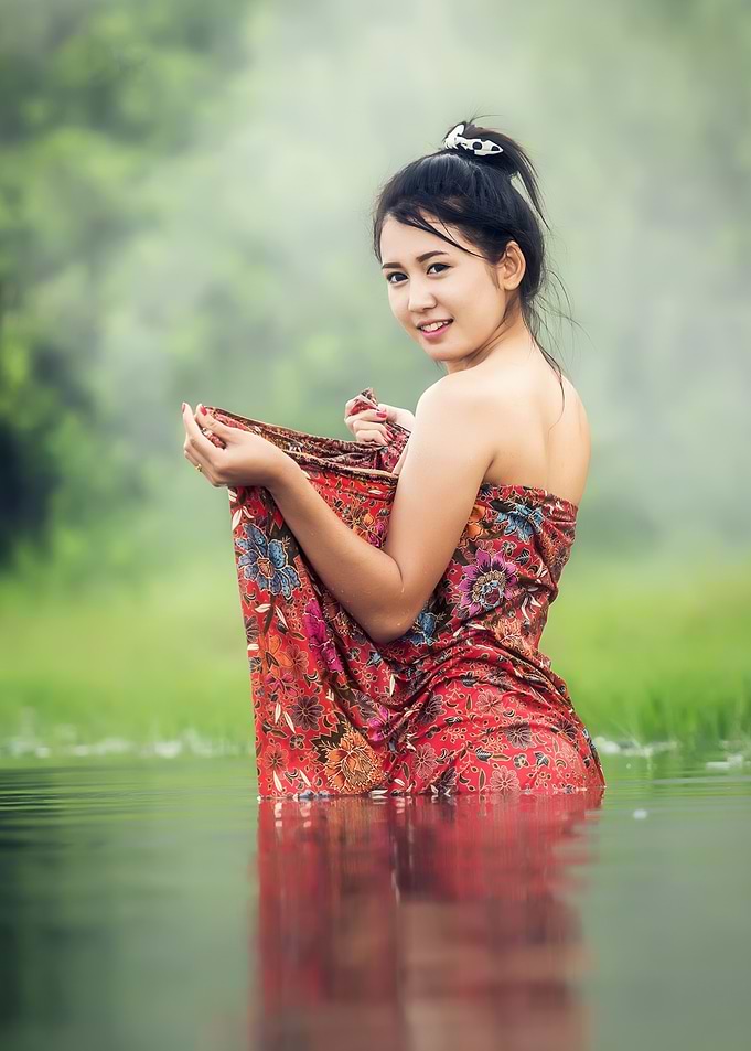 Woman in Water with Floral Sarong