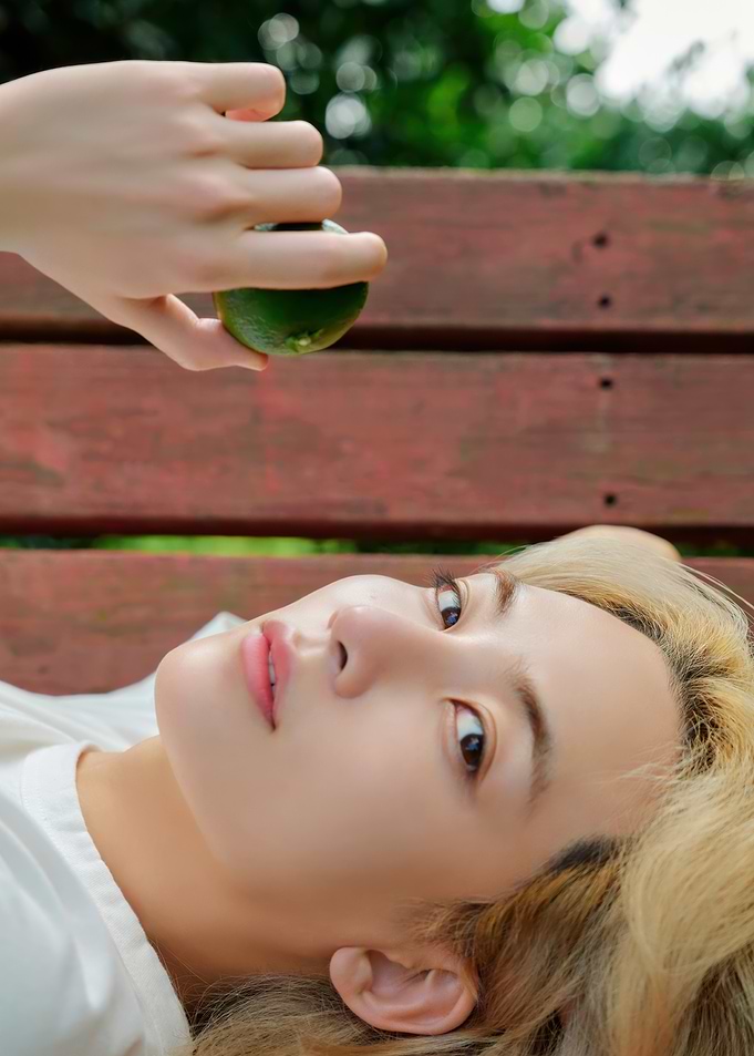 Person with Lime on Bench