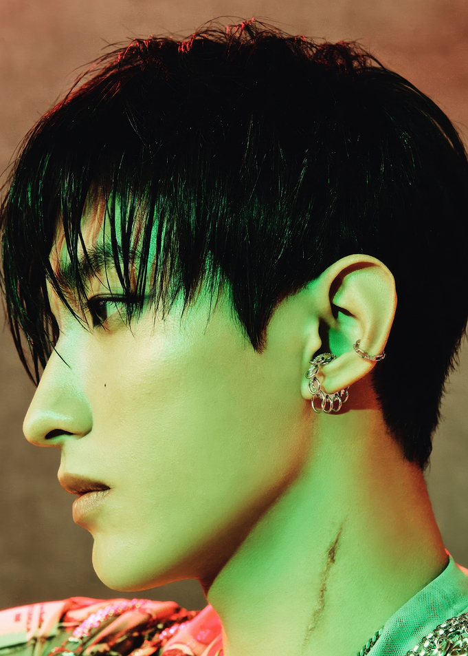 Profile of a man with earrings